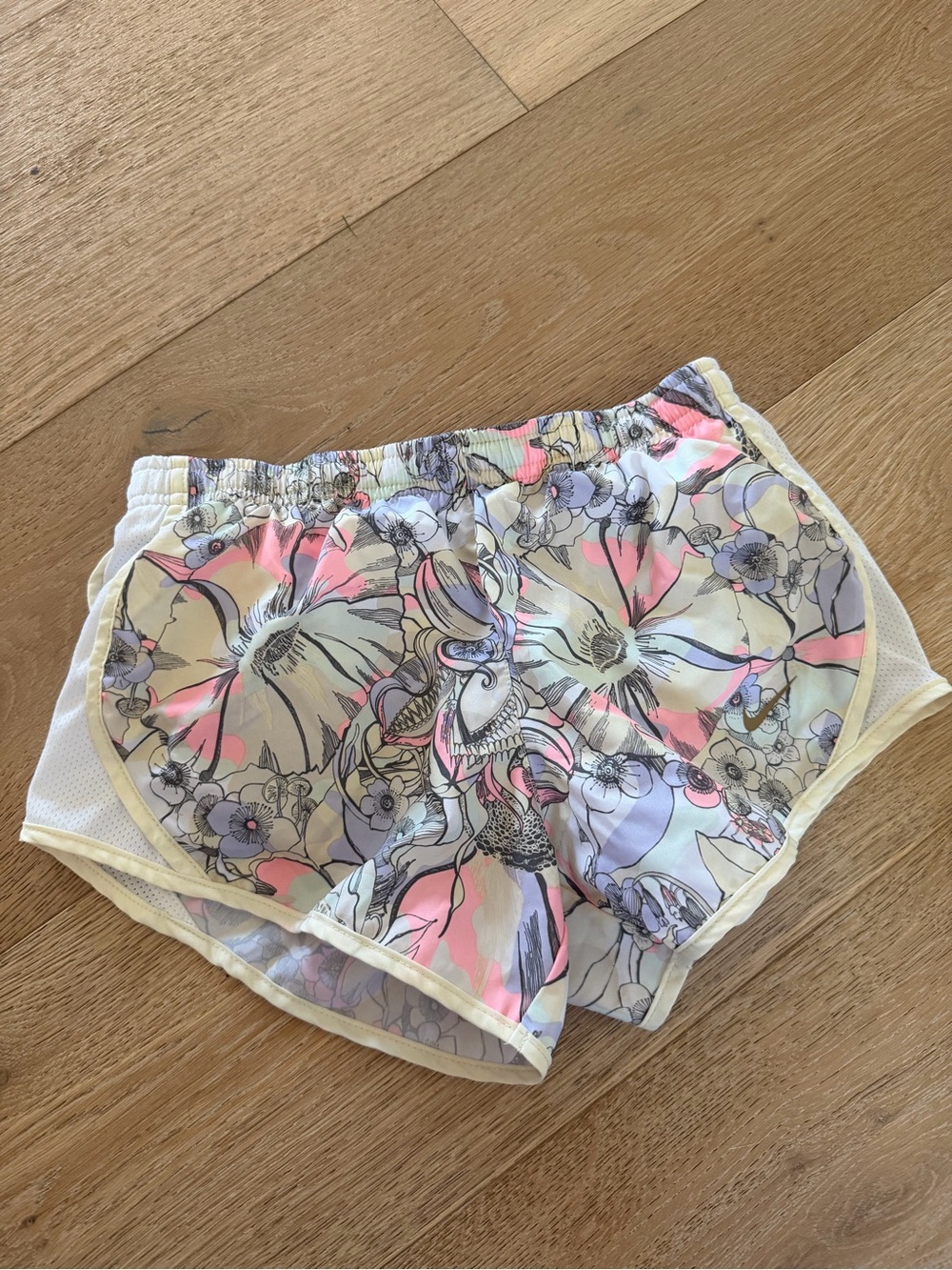 Nike Floral Print Lightweight Shorts in Pastel Pink, Lavender, and Cream